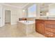Bathroom showcasing a tub, granite countertop vanity, and tile floors at 982 Old Trace Nw Rd, Concord, NC 28027