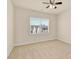 Bedroom featuring neutral carpet, a ceiling fan and natural light from a window at 982 Old Trace Nw Rd, Concord, NC 28027