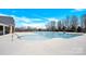 Community pool area with ample seating and swimming lanes at 982 Old Trace Nw Rd, Concord, NC 28027