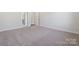Bright, carpeted bedroom with modern neutral paint at 9932 Manor Vista Trl, Kannapolis, NC 28027