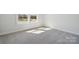 Bedroom featuring gray carpet and natural light at 9932 Manor Vista Trl, Kannapolis, NC 28027