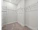 Walk-in closet features wire shelving at 9932 Manor Vista Trl, Kannapolis, NC 28027