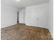 Neutral bedroom features carpeted floors, closet with doors, and neutral walls at 1036 Bramcote Ln, Charlotte, NC 28215