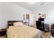 Cozy bedroom featuring a bed, desk, and stylish decor offers a comfortable retreat at 1036 Bramcote Ln, Charlotte, NC 28215