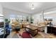 Spacious living room filled with natural light, showcasing a cozy seating arrangement at 1036 Bramcote Ln, Charlotte, NC 28215