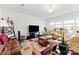 Bright living room with comfortable seating and a large window, creating a cozy atmosphere at 1036 Bramcote Ln, Charlotte, NC 28215