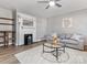 Inviting living room with fireplace, neutral decor, and ample natural light for a cozy and serene atmosphere at 105 S York St, Lancaster, SC 29720