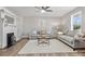 Inviting living room with fireplace, neutral decor, and ample natural light for a cozy and serene atmosphere at 105 S York St, Lancaster, SC 29720