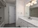 Clean bathroom featuring a tub with shower, a single sink vanity and storage at 107 Doris Ct, Lincolnton, NC 28092
