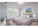 Cozy bedroom featuring a plush rug, window seat, built in bookshelves, and neutral decor at 107 Doris Ct, Lincolnton, NC 28092