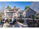 Beautiful home exterior with a spacious patio, outdoor seating, and manicured landscaping, ideal for entertaining at 107 Doris Ct, Lincolnton, NC 28092
