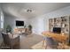 Bright home office featuring dual desks, a cozy sitting area, and ample storage, perfect for remote work at 107 Doris Ct, Lincolnton, NC 28092