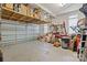 Attached garage with lots of storage, overhead storage racks, and space for multiple vehicles at 109 Stirling Heights Ln, Fort Mill, SC 29715
