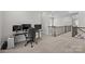 Upstairs office space with a desk and multiple monitors at 109 Stirling Heights Ln, Fort Mill, SC 29715