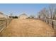 Large, fenced backyard offers plenty of space for outdoor activities and landscaping at 1178 Valley St, Statesville, NC 28677