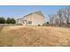 Spacious backyard with a wooden fence, offering privacy and room for outdoor activities at 1178 Valley St, Statesville, NC 28677