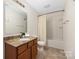 Bathroom featuring a vanity with granite countertop, toilet, and shower with curtain at 1178 Valley St, Statesville, NC 28677