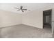 Bedroom with a ceiling fan, carpet flooring, and a doorway leading to another room at 1178 Valley St, Statesville, NC 28677