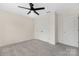 Bright bedroom with neutral walls, carpet flooring, and a modern ceiling fan at 1178 Valley St, Statesville, NC 28677