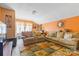 Comfortable living room with plush sofas, colorful rug, and bright windows at 11834 Mallard Ridge Dr, Charlotte, NC 28269