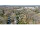 Aerial view of a charming neighborhood with mature trees at 1310 Seneca Pl, Charlotte, NC 28209
