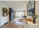 Bright living room with a modern fireplace, stylish decor, and plenty of natural light at 1310 Seneca Pl, Charlotte, NC 28209