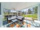 Relaxing screened porch with comfortable seating and outdoor view at 1310 Seneca Pl, Charlotte, NC 28209