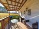 Cozy back porch features outdoor seating with a view of the yard at 137 Beaverbrook Rd, Statesville, NC 28677