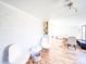 Cozy living room with white brick accent wall, hardwood floors, and open layout at 137 Beaverbrook Rd, Statesville, NC 28677