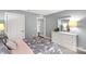 Comfortable bedroom with ample storage and a stylish dresser, creating a serene and organized space at 143 Commerce Blvd, Lancaster, SC 29720