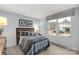 Bright bedroom featuring large window, a comfortable bed, and natural light creating an inviting atmosphere at 143 Commerce Blvd, Lancaster, SC 29720