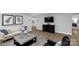Stylish living room offering comfortable seating, neutral walls, and hardwood floors at 143 Commerce Blvd, Lancaster, SC 29720