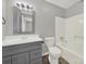 Bathroom featuring a modern vanity, framed mirror and shower-tub combination at 1642 Eagles Pl # H-103, Rock Hill, SC 29732