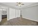 Serene bedroom with laminate floors, closet space and access to the ensuite bathroom at 1642 Eagles Pl # H-103, Rock Hill, SC 29732