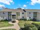 Apartment building exterior features classic architecture, sidewalks, and inviting green space at 1642 Eagles Pl # H-103, Rock Hill, SC 29732