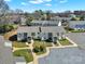 Eye-level aerial shot of apartments with traditional styling and inviting sidewalks at 1642 Eagles Pl # H-103, Rock Hill, SC 29732