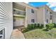 Exterior of a two-story home with a charming balcony and well-manicured landscaping at 1642 Eagles Pl # H-103, Rock Hill, SC 29732