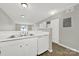 This open kitchen features white cabinetry, updated appliances, and eat-in counter space at 1642 Eagles Pl # H-103, Rock Hill, SC 29732