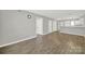 Open-concept living space featuring laminate floors, and access to the kitchen at 1642 Eagles Pl # H-103, Rock Hill, SC 29732