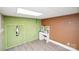 Unfinished basement featuring bare walls and a vanity area at 17154 Frog Pond Rd, Oakboro, NC 28129