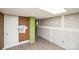 Unfinished basement featuring gray flooring, drywall, and a white door for customization at 17154 Frog Pond Rd, Oakboro, NC 28129
