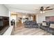 Open-concept living room connecting to the dining area and kitchen at 17154 Frog Pond Rd, Oakboro, NC 28129