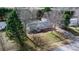Aerial view of the home with mature trees and landscaping at 1841 Ellick Dr, Newton, NC 28658
