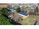 Overhead view of the house surrounded by trees, with a shed and small back deck at 1841 Ellick Dr, Newton, NC 28658