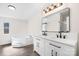 Bathroom featuring double vanity, large soaking tub, and modern fixtures at 1841 Ellick Dr, Newton, NC 28658