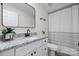 Modern bathroom features granite counters, black hardware, and a tub with shower at 1841 Ellick Dr, Newton, NC 28658