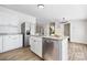Modern kitchen with stainless steel appliances, granite countertops, and a functional kitchen island at 1841 Ellick Dr, Newton, NC 28658