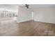 Open-concept living space with hardwood floors and lots of natural light at 1841 Ellick Dr, Newton, NC 28658