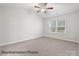 Bright bedroom featuring plush carpeting, natural light, and ample space for rest and relaxation at 2021 Mcdonald Dr, Charlotte, NC 28216
