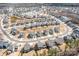 Aerial view of neighborhood showcasing well-maintained homes, landscaping, and community layout at 2024 Linn Cv, Waxhaw, NC 28173